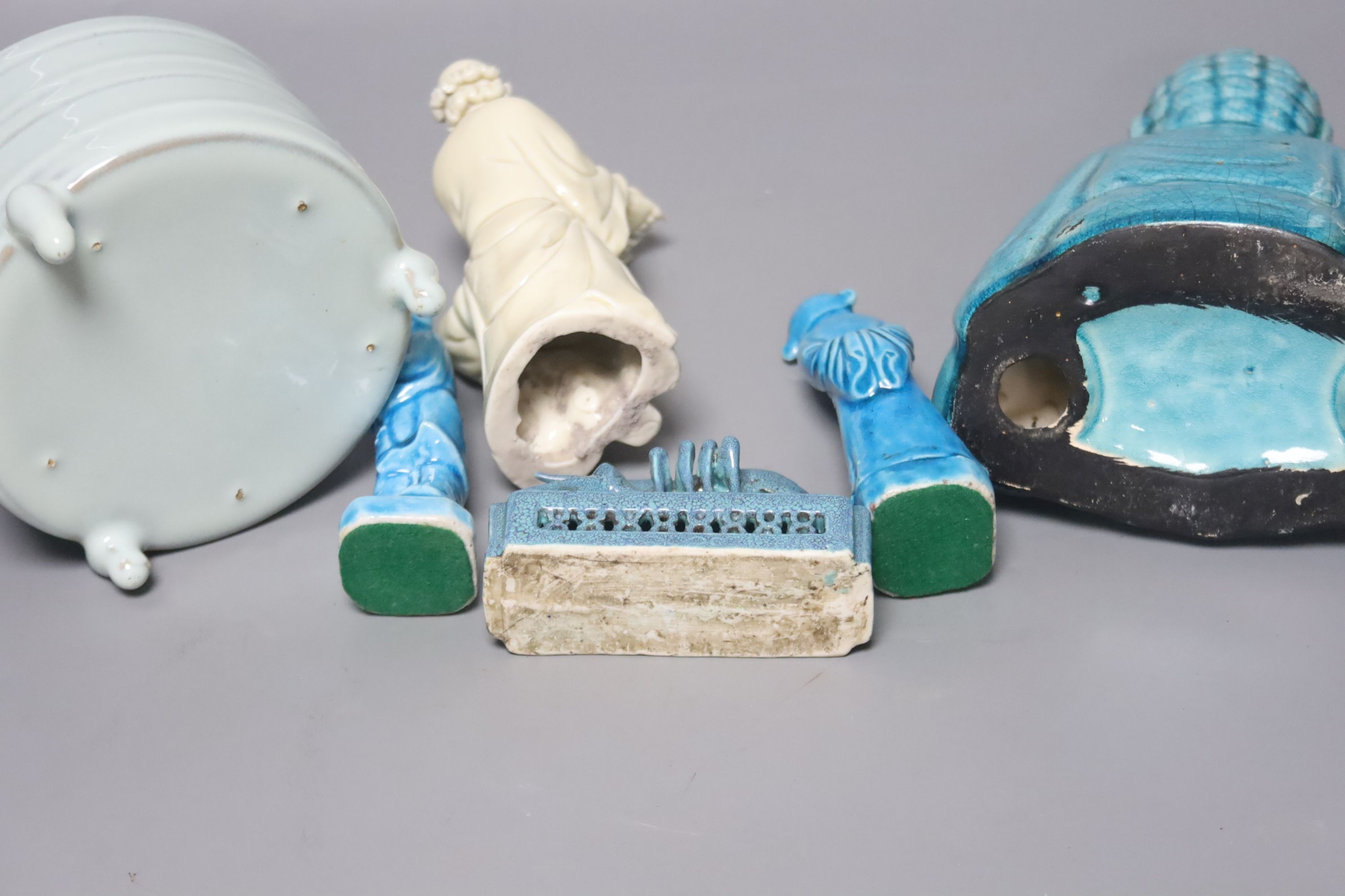 A Chinese turquoise glazed Buddha, height 21cm, a pair of figurines, a robin’s egg glazed model of a lobster, and a tripod censer
